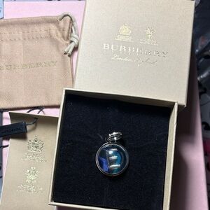Burberry Silver Pendant with Letter “E”